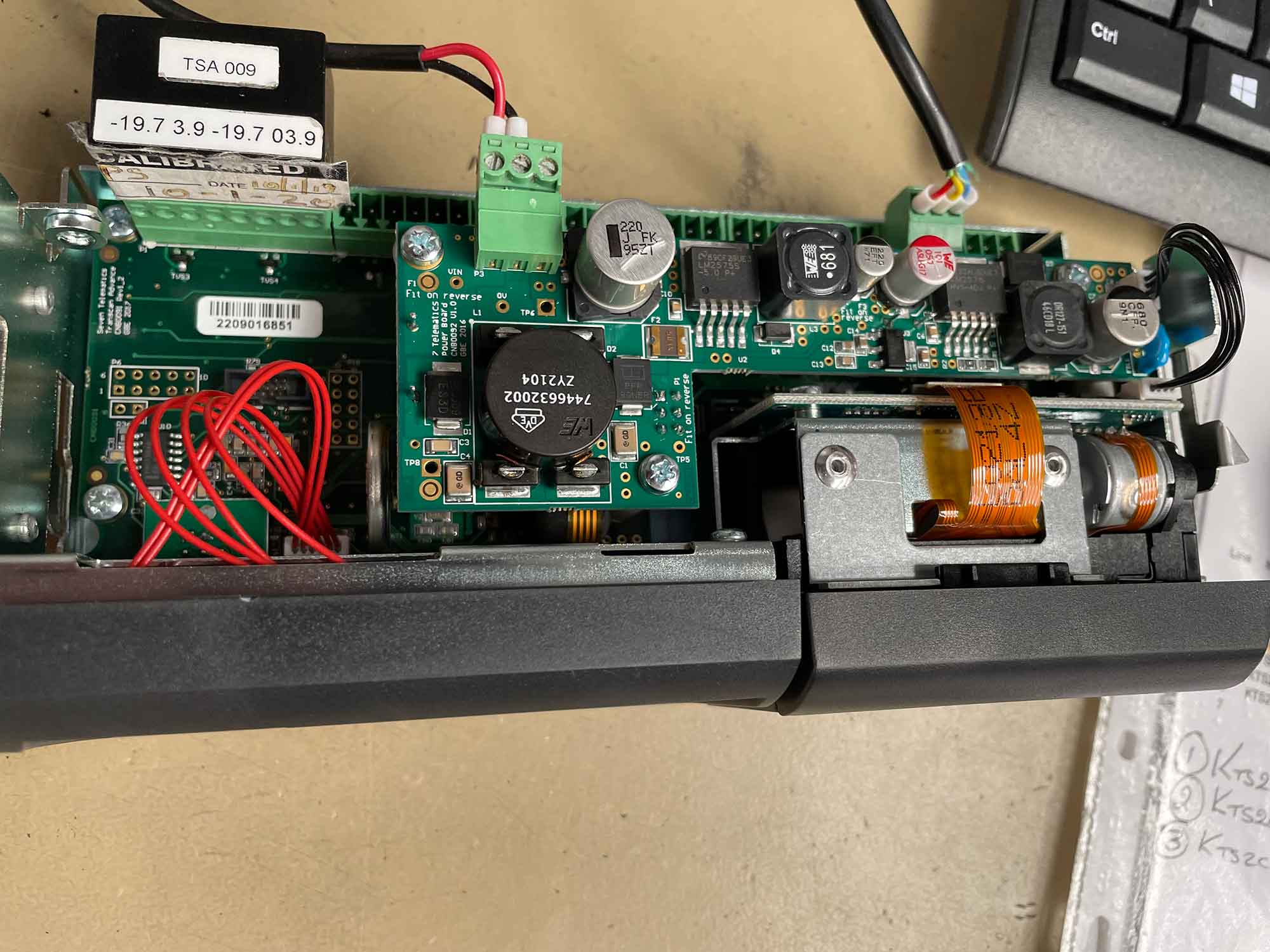 A close up of a populated printed circuit board